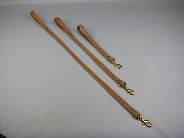 Left to Right: 3', 2', and 1' x 3/4" Leather traffic leads in Tan